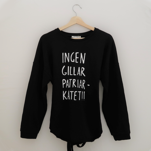 Svart tröja med band, Ingen gillar patriarkatet, S